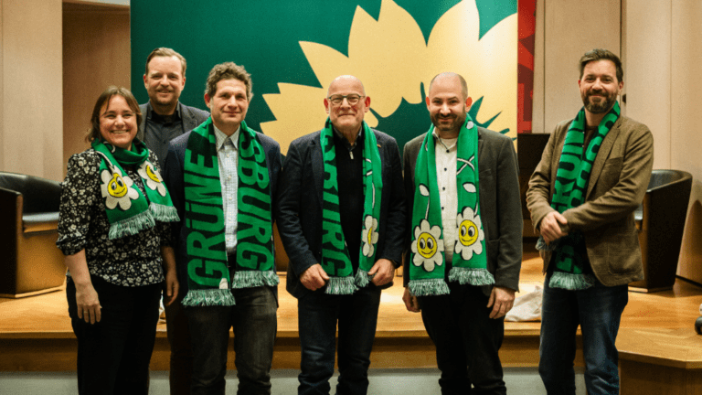 GRÜNE skizzieren Wege zu einer nachhaltigen Mobilität in Augsburg – Verkehrsminister Winfried Hermann MdL berichtet aus Baden-Württemberg 